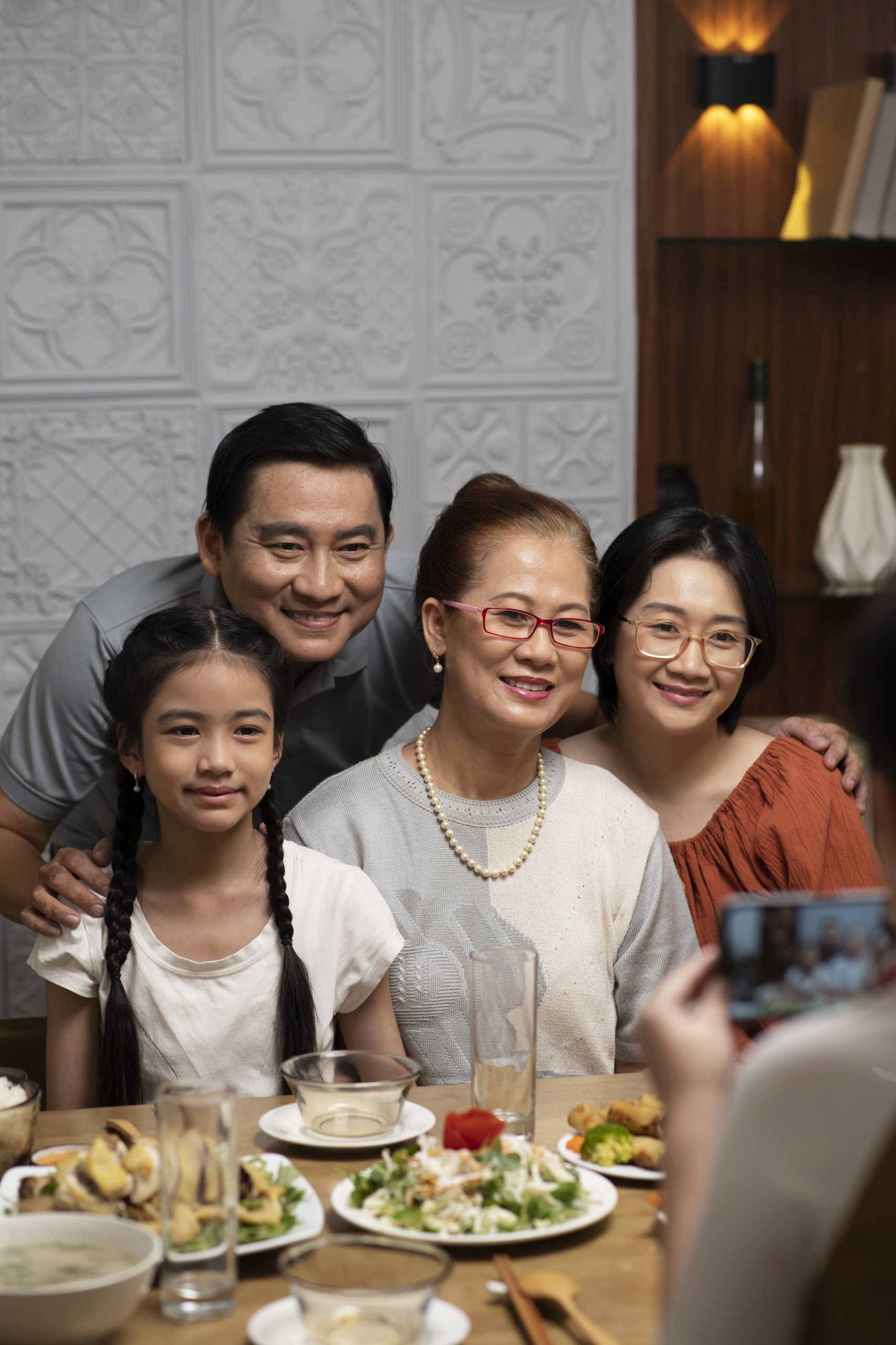 Happy family portrait, illustrating peace of mind and secure financial future with JS Wealth Sdn Bhd